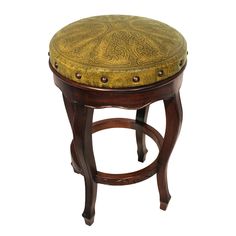 a wooden stool with an intricate design on the seat and foot rests against a white background