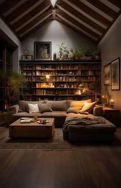 a living room filled with lots of furniture and bookshelves covered in shelves next to a wooden floor