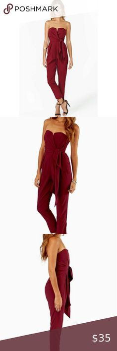 Lulus Burgundy Strapless Knot tie Jumpsuit NWT New with tag!  Very flattering strapless sweetheart neckline jumpsuit with a knotted tie sash at waist. Top has boning at sides and at bust for a flattering fit. Burgundy/Maroon color. Size small. 97% Polyester, 3% Spandex. Has good stretch to it. Mustard Seed Other Red Strapless Jumpsuit For Summer Party, Chic Red Strapless Jumpsuit For Evening, Bandeau Strapless Jumpsuit For Party, Chic Strapless Jumpsuits And Rompers For Going Out, Elegant Red Strapless Jumpsuit For Date Night, Flirty Strapless Jumpsuits And Rompers For Date Night, Elegant Strapless Jumpsuits And Rompers For Going Out, Flirty Strapless Jumpsuits For Date Night, Red Strapless Jumpsuits And Rompers For Party