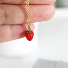 "Beautiful and cute little Strawberry charm necklace. Made of gold and enamel Strawberry with skinny gold plated skinny brass chain. Soft and warm. Great for gifts, everyday or special occasions.  Your item will ship in a gift box. Please feel free to contact me if you have any questions. ♥ Length  14\" - 20\"  ♥ Charm approx 3/8\"  ♥ Gold plated over brass / Enamel ♥ Silver color in here   www.etsy.com/listing/707121670  ♥  See more Rudiana Accessories  Rudiana.etsy.com" Valentine's Day Gift Enamel Charm Necklaces, Dainty Charm Necklaces As Gift, Dainty Charm Necklace As Gift, Valentine's Day Gift Enamel Charm Necklace, Everyday Cute Nickel-free Charm Necklaces, Cute Charm Necklaces For Gifts, Cute Pendant Charm Necklace For Gift, Cute Gold Necklace For Birthday Gift, Dainty Red Charm Necklace For Everyday