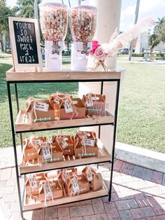 an outdoor stand with candy and candies for sale