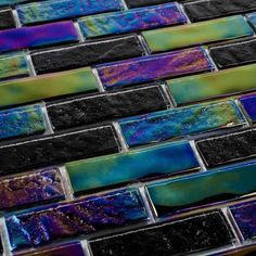 a close up view of some colorful glass tiles