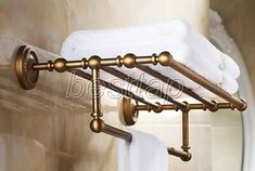 an old fashioned bathroom towel rack is shown