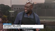 a man in an apron is talking to someone on the television show anthony williams