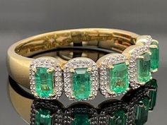 Here you get an incredible ring made of 585 yellow gold with a beautiful emerald and white diamonds. The emerald probably got its name from the Greek word Smaragdos, which means "the green goddess of all stones". "Diamond" comes from the Greek word "adamas," which means "invincible" and emphasizes the special hardness of this gemstone. According to tradition, the diamond has been around since 800 BC. Mined in India in 1725, raw precious stones were also discovered in another source: Brazil. Diamonds have a number of mythological and esoteric attributions: Greek philosophers believed celestial spirits resided in diamonds; The Romans believed that diamonds were tears of the gods or shards of stars that had fallen to the earth. You shouldn't miss this exclusive piece of jewelry! Gold Emerald Ring With Pave Setting, Gold Emerald Ring With Pavé Setting, Gold Emerald Cut Ring With Pave Setting, Luxury Green Diamond Ring Stamped 14k, Greek Philosophers, Green Goddess, Greek Words, Multi Stone Ring, Emerald Diamond