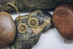 "Beautiful gold chrysanthemum dangle earrings, a simple but elegant look for any outfit! The brass ear wires measure 1 3/10\" x 9/10\", and the gold chrysanthemums measure 3/4\" x 3/5\" (Total length is approximately 2\") All items are lead and nickel free, message with any questions, thanks!" Brass Drop Earrings With Flower Charm, Flower Shaped Brass Jewelry With Matching Earrings, Elegant Brass Flower Earrings Nickel Free, Dainty Gold-plated Flower Charm Earrings, Gold Plated Dainty Earrings With Flower Charm, Gold Flower Earrings As Gift, Dainty Gold Plated Earrings With Flower Charm, Everyday Gold Flower Charm Earrings, Dainty Gold Earrings With Flower Charm