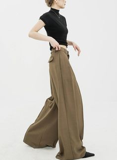 Infuse elegance into your wardrobe with our Wide Leg Criss-Cross Pleated Palazzo Trousers, a harmonious blend of comfort and chic.
Crafted with attention to detail, these trousers feature a high-waist cut for a flattering silhouette and come in a timeless black shade. Asymmetrical pleats add a touch of uniqueness, while the fluid fabric encapsulates a modern, commute-friendly vibe. They're perfect for both a professional setting and casual outings.
Pair them with a fitted blouse for work or a re Palazzo Trousers, Black Shade, Work Blouse, Shades Of Black, Criss Cross, Wide Leg, Trousers, High Waisted, Wardrobe