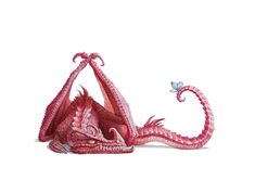 a red dragon sitting on top of a white floor