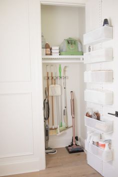 the closet is clean and ready to be used as a storage area for cleaning supplies