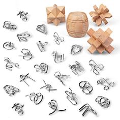 several wooden pieces and metal clips on a white surface