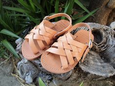 Children's comfortable and high quality sandals made from genuine cowhide leather in natural color. Strong and durable woven multi strap sandals also featuring stitched leather insoles, buckle closures and slip resistant rubber soles. Please check below for correct size. EU= 21 (14cm)UK= 4US= 5 EU= 22 (15cm)UK= 5US= 6 EU= 23 (15.5cm)UK= 6US= 7 EU= 24 (16cm)UK= 7US= 8 EU= 25 (17cm)UK= 8US= 9 EU= 26 (17.5cm).... UK= 8.5US= 9.5 EU= 27 (18cm)UK= 9US= 10 EU= 28 (19cm)UK=10US= 11 EU= 29 (19.5cm)UK=11U Natural Closed Toe Sandals With Adjustable Fit, Leather Open Toe Sandals With Soft Sole, Leather Sandals With Soft Sole For Beach, Natural Leather Sandals With Open Heel, Closed Toe Leather Sandals In Natural Color, Natural Leather Open Heel Sandals, Natural Leather Closed Toe Sandals, Natural Leather T-strap Sandals With Round Toe, Natural Leather-lined Sandals For Beach