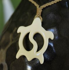 Beautifully handcrafted Buffalo bone handcrafted pendant on woven adjustable jute neck cord. Polished and detailed to bring out the best in each design. Set includes one of each Fish hook, Whale Tail and Petroglyph Honu! Individually boxed to give as gifts. Great quality and style at an affordable low price! Our buffalo bone pendants are great in and out of the water so you never have to take them off. Braided cording is adjustable so it fits from keiki to adults. Great for men and women, boys a Bone Pendant, Whale Tail, Design Set, Fish Hook, Pendant Set, Low Price, Buffalo, Bones, You Never