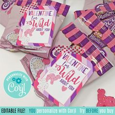 valentine's day candy bags with pink and purple decorations on them, including cookies