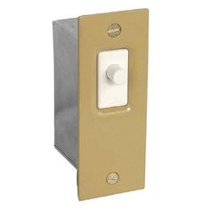 the light switch is gold and has a white button on it's side,