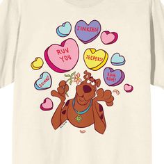 Show some love for your favorite cartoon characters with this charming natural Scooby-Doo crew neck short sleeve t-shirt, featuring Scooby surrounded by candy conversation hearts on the front and "Scooby-Doo Lovers" in bright yellow letters on the back. Crafted from comfortable cotton, this shirt offers both style and ease of care. It's machine washable on cold with similar colors and can be tumble dried on low heat, ensuring hassle-free maintenance. Playful Graphic Print T-shirt For Valentine's Day, Playful Short Sleeve Top For Valentine's Day, Playful Crew Neck T-shirt For Valentine's Day, Playful Valentine's Day Crew Neck T-shirt, Fun Short Sleeve T-shirt For Valentine's Day, Fun Valentine's Day T-shirt With Short Sleeves, Valentine's Day Fun Short Sleeve T-shirt, Cute Short Sleeve T-shirt For Valentine's Day, Yellow Letters