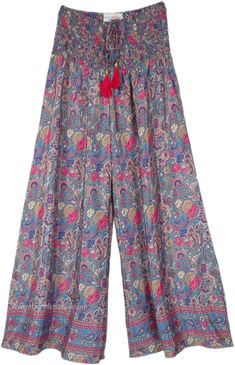 Floral and paisley prints on wide-leg pants which are soft and flowy, and have a smocked waist. The loose-fit wide-leg printed rayon pants have a comfortable waist that will fit a small to a large. #tlb #SplitSkirtsPants #beachwrap #Printed #bohemianfashion #festivalpants Bohemian Spring Pants With Paisley Print, Bohemian Summer Pants With Paisley Print, Bohemian Paisley Print Summer Pants, Casual Boho Print Wide Leg Harem Pants, Summer Beach Pants With Paisley Print, Casual Wide Leg Boho Print Harem Pants, Paisley Print Long Pants For Vacation, Bohemian Bottoms With Paisley Print, Bohemian Beach Pants With Paisley Print