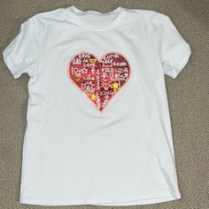 Nwot Heart Tee Material Is Thicker Than Your Average Tee Very Nice Quality Size Xl Very Stretchy Casual Red Shirt With Heart Graphic, White Short Sleeve Tops With Heart Print, White Graphic Tee For Valentine's Day, White Graphic Tee With Heart Print, Summer White Shirt With Heart Graphic, White Tops With Heart Graphic For Valentine's Day, Casual Valentine's Day Top With Text Print, Casual Red Heart-shaped T-shirt, White Cotton Shirt For Valentine's Day