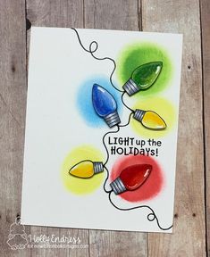 a card with lights on it that says light up the holidays