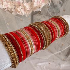 Cherry Bomb Bangle stack - SOKORA JEWELSCherry Bomb Bangle stackBANGLES Bridal Survival Kit, Red Bangles, Bangle Box, Bridal Chura, Hand Harness, Fancy Jewellery Designs, Bridal Choker, Bridal Necklace Set