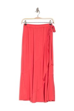 A pretty faux wrap midi skirt features ruffled trim for effortless feminine style. Flowy Viscose Maxi Skirt For Spring, Flowy Asymmetrical Rayon Maxi Skirt, Spring Rayon Asymmetrical Maxi Skirt, Spring Asymmetrical Rayon Maxi Skirt, Asymmetrical Rayon Maxi Skirt For Spring, Flowy Rayon Maxi Skirt With Ruffles, Spring Ruched Midi Maxi Skirt, Flowy Ruffled Rayon Maxi Skirt, Summer Viscose Skirted Bottoms