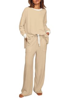 PRICES MAY VARY. ✔Design: Two-Piece Set/Long Sleeve Pullover Tops/Round Neck/Solid Color/Long Leg Pants/wide Foot/Lightweight/Loose Fit/Two Piece Tracksuit Set/Loungewear Set/Jogger Set/Drawstring Waist/High Waist/Winter Outfits For Women/Fall Fashion Clothes For Women 2023 ✔Soft Fabric: Quality Is Our First Consideration. After A Long Time Of Consideration And Selection Of Fabrics, We Adopt A Soft And Lightweight Fabric To Give You A Wonderful Wearing Experience. More Importantly,Please Wash It Split Sweatshirt, Sweater Sets Womens, Lounge Sets For Women, Womens Loungewear Sets, Wide Leg Sweatpants, Jogging Suit, Tracksuit Set, Loungewear Set, Fall Fashion Outfits