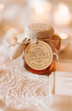 a bottle of honey sitting on top of a table