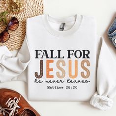 Cozy up this fall with our Personalized Christian Fall Sweatshirt 🍂, perfect for those chilly days of reflection and gratitude. This custom Thanksgiving sweatshirt features a heartfelt Jesus design ✨, making it a meaningful addition to your wardrobe. Whether you're attending a fall gathering or just enjoying a quiet day at home, this Jesus shirt offers both comfort and inspiration 🙏. Ideal as a thoughtful gift for Christian women 🎁, this fall shirt combines style with faith. Embrace the seaso Fall Christian Tshirts, White T-shirt With Lettering For Fall, Fall Inspirational Graphic Print Sweatshirt, Inspirational Graphic Print Sweatshirt For Fall, Inspirational Graphic Print Fall Sweatshirt, Inspirational Crew Neck T-shirt For Fall, Inspirational Letter Print Sweatshirt For Fall, Inspirational Text Print Sweatshirt For Fall, Inspirational Text Print Fall Sweatshirt