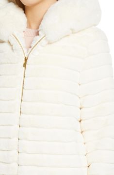 Pop some plush into the snowy season in this fabulous faux fur jacket fixed with a cozy hood. Lined 100% polyester faux fur Dry clean Imported Faux Fur Coat With Zipper For Cold Weather, Winter White Faux Fur Coat For Cold Weather, Hooded Faux Fur Coat With Trim, Hooded Faux Fur Outerwear In Winter White, Chic Hooded Fur Coat With Faux Fur Trim, Hooded Faux, Faux Fur Jacket, Fur Jacket, Black Cream