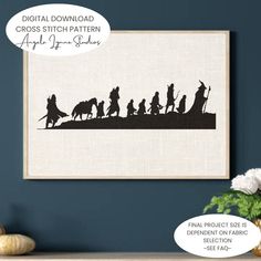 a cross stitch pattern with the silhouettes of people on horseback, and text that reads digital