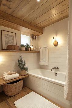 a bathroom with wooden floors and white walls