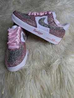 Bling Air force 1 are perfect for weddings, proms, homecomings, birthdays, special events or just your everyday girly girl. These pair are sure to turn heads with all the sparkle and shine.  These are hand painted then high-quality rhinestones are applied by hand. Colors shown are Pink & Silver PLEASE BE SURE OF YOUR SIZE BEFORE PLACING ORDER, DUE TO ITEM BEING CUSTOM AND MADE TO ORDER I DO NOT ACCEPT ANY REFUNDS NOR EXCHANGES IF YOU'RE NEED BY DATE IS CLOSE, PLEASE SEND ME A MESSAGE 1ST BEFORE PLACING ORDER TO MAKE SURE I AM ABLE TO COMPLETE IN A TIMELY MATTER RUSH ORDERS are available for a fee please message me 1st before placing order. Once an order is placed it CANNOT be CANCELLED, RETURNED, OR EXCHANGED ALL SALES ARE FINAL! Check us out on Instagram Like and follow/Extremebling_bysha Bling Air Force 1, Sneaker Ball, Bedazzled Shoes, Nike Shoes Women Fashion, Pretty Sneakers, Surprise Az, Wedding Sneakers, Nike Fashion Shoes, Cute Nike Shoes