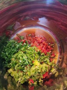 chopped up vegetables in a blender bowl