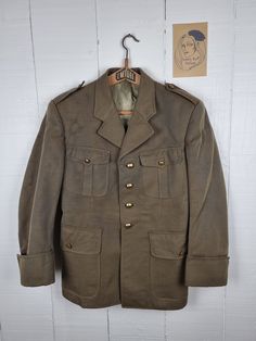 Vintage 1978 Army Jacket Size Small 38 inch Chest Twill French Military Jacket Ets Utah Paris Epaulettes Brass Buttons Militaria Collectors Uniform Green Jacket Size:  Chest: 48cm wide / 96cm all round (UK Small - Medium : 38 inches)  Jacket Length: 70cm (27.5 inches) Underarm to cuff: 38cm (15 inches) Condition: Very good. Vintage Khaki Blazer With Pockets, Vintage Khaki Winter Blazer, Vintage Khaki Blazer For Fall, Military Double-breasted Blazer With Pockets, Military Style Double-breasted Blazer With Pockets, Military Style Long Sleeve Single Breasted Blazer, Military Style Single Breasted Long Sleeve Blazer, Vintage Blazer With Flap Pockets, Vintage Long Sleeve Blazer With Flap Pockets