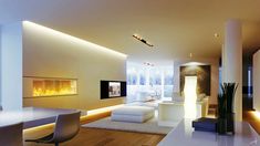 a modern living room with white furniture and wood flooring is lit by recessed lights