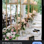 an image of a table setting with candles and flowers on the tables for a wedding reception