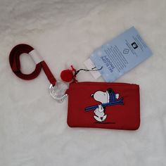 Vera Bradley Peanuts Collection Ski Snoopy Zip Id Lanyard. Nwt Spot All Of The Smile-Inducing Scenes And Nostalgic Characters In Our Can't-Miss Collaboration, Vera Bradley Peanuts Our Fan-Favorite Zip Id Case Is Now Combined With Our Lanyard For The Ultimate In Hands-Free Organization. The Very Best Feature? This Style Is Designed With Our Recycled Cotton Made From 100% Cotton, It's Everything You Know And Love About Our Go-To Fabrication: The Softness, The Comfort, The Vibrancy Now Crafted With Lanyard Wallet Vera Bradley, Nostalgic Characters, Window Interior, Id Lanyard, Pill Case, Keychain Wallet, Coin Wallet, Snoopy And Woodstock, Small Pouches