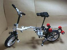 a toy bike made out of lego parts