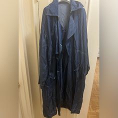 Naadam Trench In Color Blue (Looks Like Denim) Size L. Silky Material, Has White Stitching Details, Hook And Eye Closure At Collar And Pockets. Never Worn. Oversized Fit Indigo Denim Utility Outerwear, Oversized Indigo Denim Outerwear, Oversized Fits, Trench Coat, Blue Color, Jackets For Women, Jackets & Coats, Collar, Blue