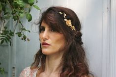 This stunning goddess crown is decorated with an assortment of leaves, flowers, crystals  and pearls on each side. Its worn on the back of the head, and by twisting some strands of hair around the back bare part of the band you can achieve a stunning hairdo.*Comes with updo instructions on how to create a magical hair do.*Comes in a pretty gift wrap.*Could be requested in either 14k gold, rose gold or silver plated brass.*The leaves and flowers might be slightly different then the ones shown in Updo Instructions, Goddess Headband, Floral Goddess, Magical Hair, Goddess Crown, Bridal Hair Accessory, Leaves Headband, Wreath Flower, Back Of The Head