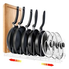 a rack with pots and pans hanging from it