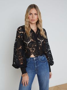 The Odelia is our modern take on the lace blouse, now in chic black. A boxy, cropped silhouette delivers a cool, effortless feel that balances the paisley lace and blouson sleeves. A sharp collar and button cuffs lend tailored crispness. Wear with black denim for a monochromatic statement. Slip on over a colorful bikin Multi Millionaire, Pastel Knits, Cropped Button Down, Paisley Fashion, Unique Beach, Knit Denim, Beach Ready, Blouse Outfit, Paisley Design