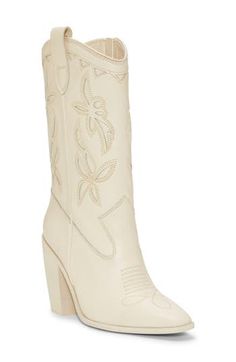 Classic embroidery, a notched topline and square toe give Western-inspired style to this leather boot. 3 1/2" heel 9 3/4" shaft Side zip closure Leather upper/synthetic lining/rubber sole Imported Spring Stacked Heel Snip Toe Boots, Spring Boots With Stacked Heel And Snip Toe, Stacked Heel Snip Toe Boots For Spring, Western Style Mid-calf Boots With Block Heel For Spring, Fitted Cream Boots For Rodeo, Western Boots With Block Heel, Western Style Square Toe Mid-calf Boots For Spring, Western Style Boots With Block Heel, Fitted Western Boots With Block Heel