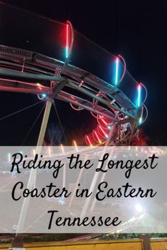 a ferris wheel with the words riding the longest coaster in eastern tennessee at night