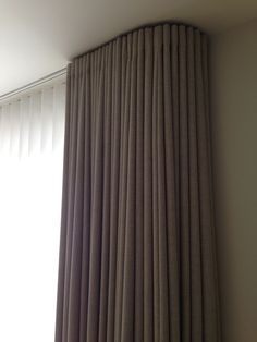 the curtains are closed in front of the window