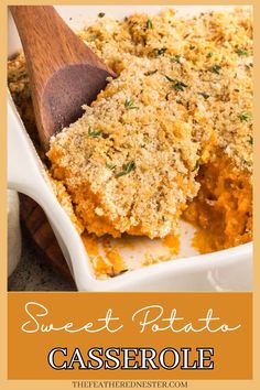 sweet potato casserole in a white dish with a wooden spoon on the side