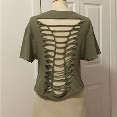 This Sweet Looking Crop Top Is Hand Styled To Perfection, With Ladder Design In Back. Army Green Color T-Shirt, With Front Pocket. Crop Is 8” From Armpit To Bottom. Size Medium Nwot Never Worn Edgy Crew Neck Crop Top For Summer, Edgy Summer Crop Top With Crew Neck, Casual Short Sleeve Crop Top For Festivals, Fitted Distressed T-shirt For Summer, Summer Ripped Stretch Top, Summer Stretch Ripped Tops, Trendy Ripped Stretch Tops, Ripped Grunge Tops For Summer, Trendy Fitted Ripped Tops