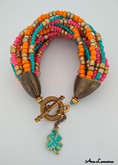 "This exquisite piece beautifully indicates your originality and unique taste. MATERIALS: - Glass Seed Beads - Metal MEASUREMENTS: - Length: 19 cm or 7.48\" - Weight: 50 gr or 1.76 oz JOIN OUR NEWSLETTER: https://bit.ly/395E3x2" Colorful Adjustable Multi-strand Jewelry, Colorful Bracelets With Spacer Beads As Gift, Colorful Bracelets With Spacer Beads For Gifts, Multi-strand Bracelets With Colorful Beads For Jewelry Making, Unique Multi-strand Bracelets With Colorful Beads, Handmade Colorful Bracelet Jewelry, Nickel-free Multicolor Festival Bracelets, Handmade Colorful Jewelry Bracelet, Multicolor Nickel-free Bracelets For Festivals