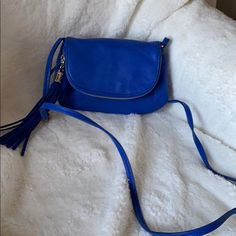 Express Royal Blue Mini Crossbody Bag With Tassel Zip. Nwot Strap Is Adjustable. 50” At Longest Length. Magnetic Button Closure With Inside Zip Pocket. Flap Is Deep Zip Pocket 8” Long X 1” Wide X 6” High Blue Tassel Bags For Daily Use, Blue Fringe Bags For Daily Use, Blue Shoulder Bag With Tassels For Daily Use, Blue Fringe Shoulder Bag For Daily Use, Blue Bag With Tassels For Everyday Use, Blue Shoulder Bag With Tassels For Everyday Use, Blue Everyday Bag With Tassels, Casual Blue Bag With Tassels, Bag With Tassel