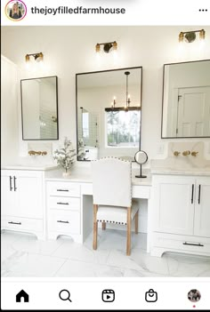 a white bathroom with two sinks and mirrors on the wall next to it's vanity