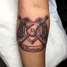 a baseball tattoo with two bats and an eagle